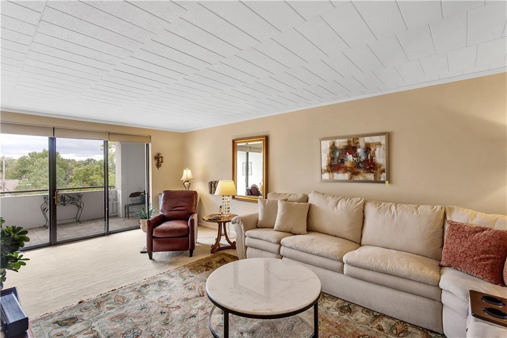 900 Washington Road, Unit 412 Pittsburgh, PA 15228 - Photo 6 of 34 a living room with furniture and a large window