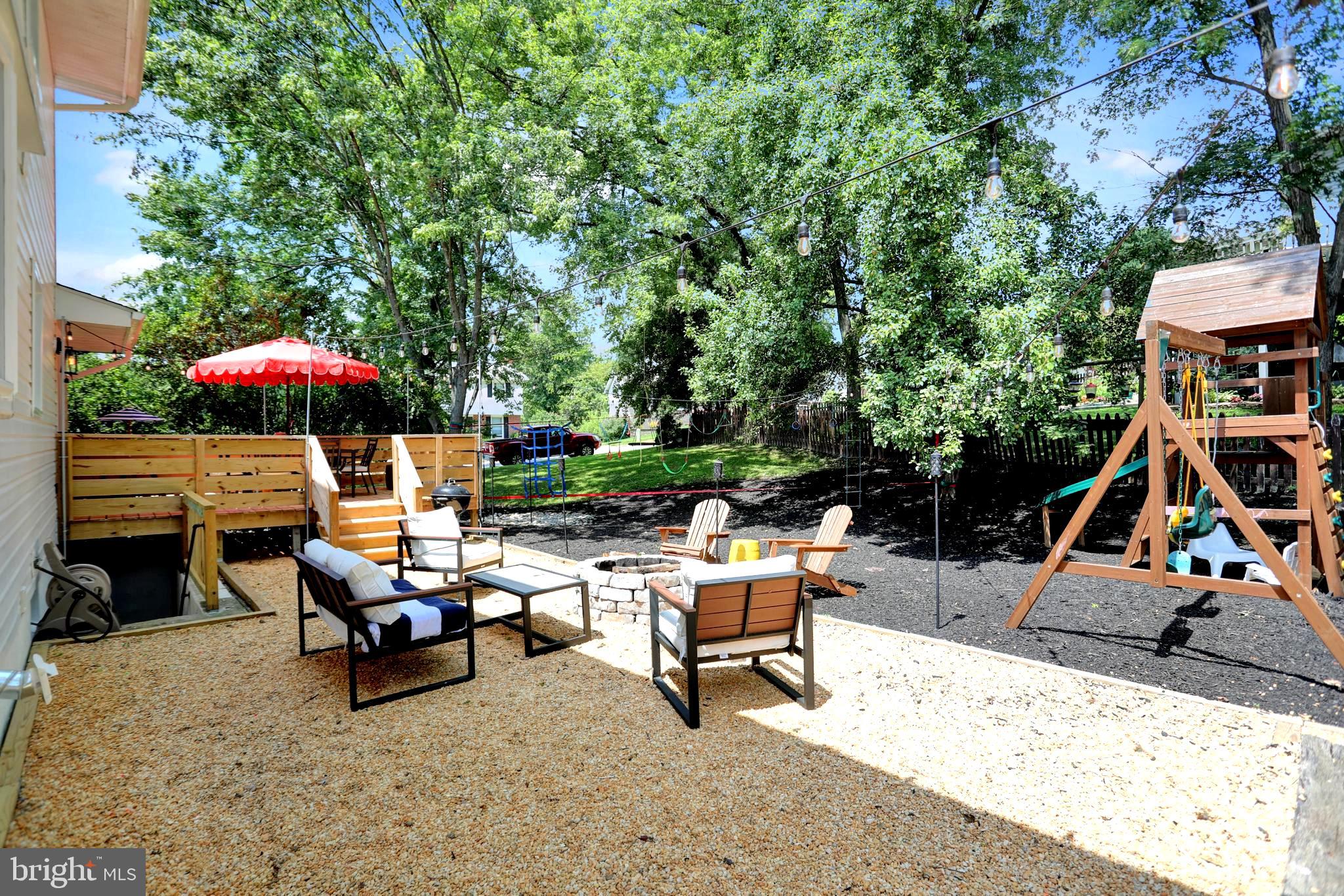 906 Farmstead Road Cockeysville, MD 21030 - Photo 47 of 52 Pebble patio w built in fire pit