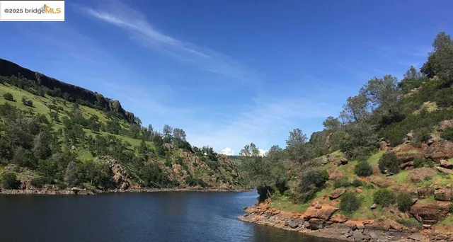 a view of lake with mountain