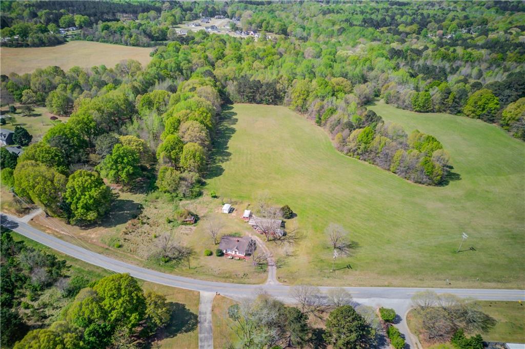 1023 Poplar Street Monroe, GA 30655 - Photo 11 of 25 an aerial view of a house with a yard