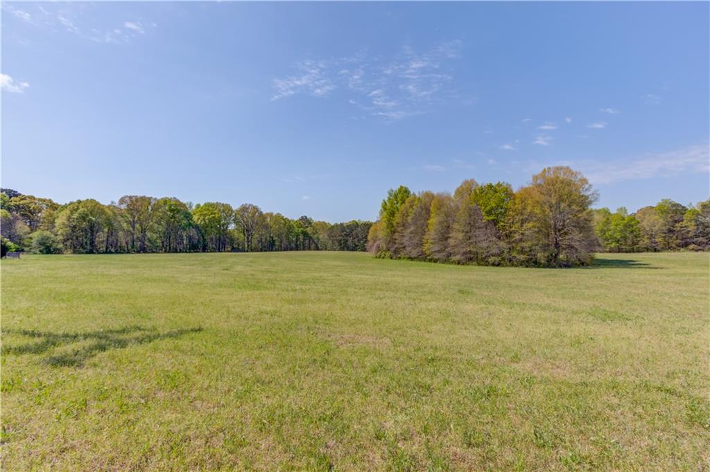 1023 Poplar Street Monroe, GA 30655 - Photo 18 of 25 a view of lake and mountain view