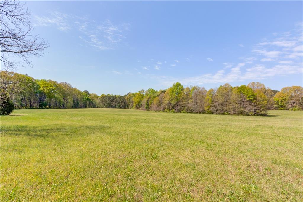 1023 Poplar Street Monroe, GA 30655 - Photo 19 of 25 a view of an ocean and a yard