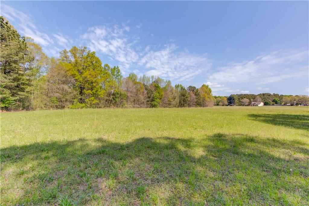 1023 Poplar Street Monroe, GA 30655 - Photo 23 of 25 a view of an ocean and a houses