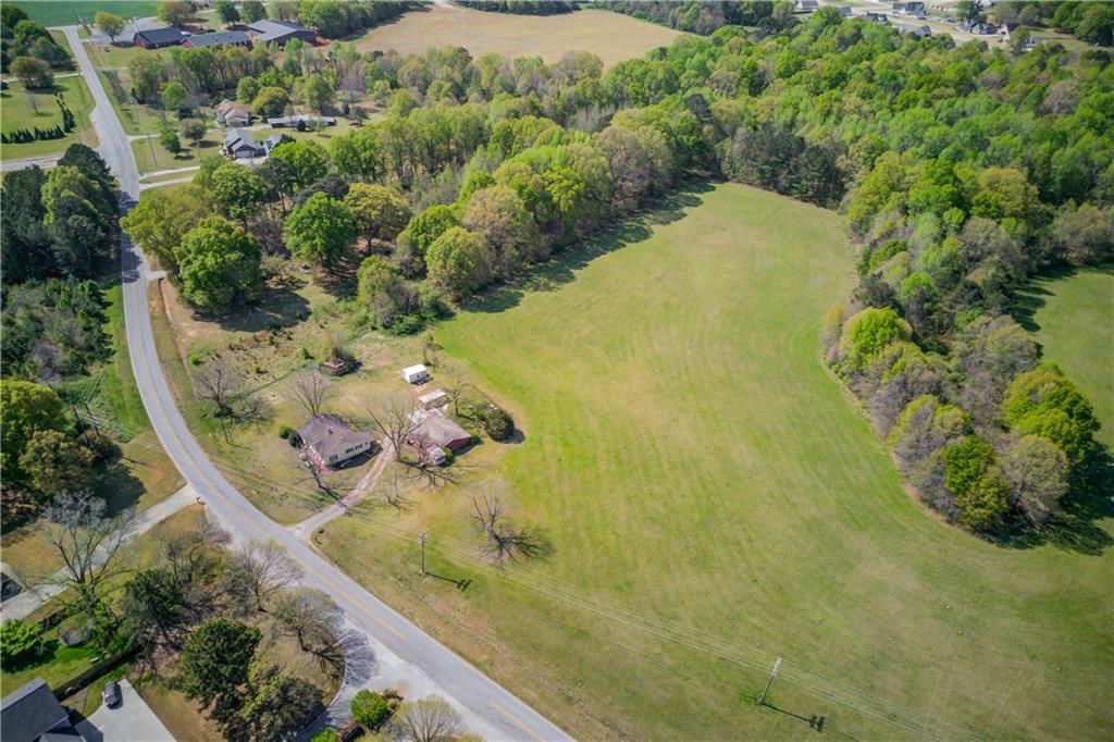 1023 Poplar Street Monroe, GA 30655 - Photo 10 of 25 a view of a swimming pool with a yard