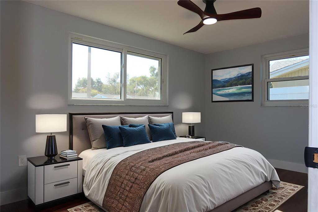 7521 Coventry Drive Port Richey, FL 34668 - Photo 15 of 45 a bedroom with a bed and window