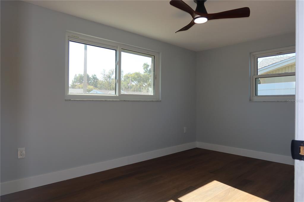 7521 Coventry Drive Port Richey, FL 34668 - Photo 16 of 45 an empty room with a window