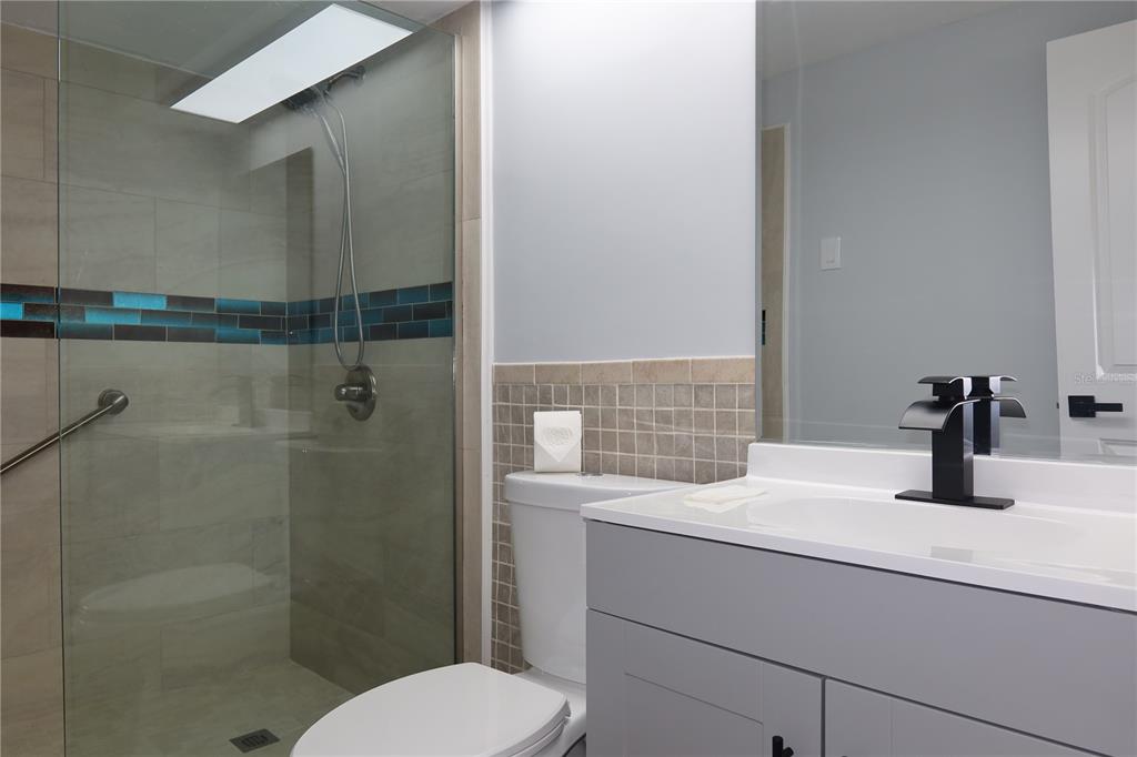 7521 Coventry Drive Port Richey, FL 34668 - Photo 17 of 45 a bathroom with a sink and toilet