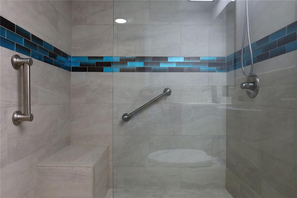 7521 Coventry Drive Port Richey, FL 34668 - Photo 18 of 45 a bathroom with a shower