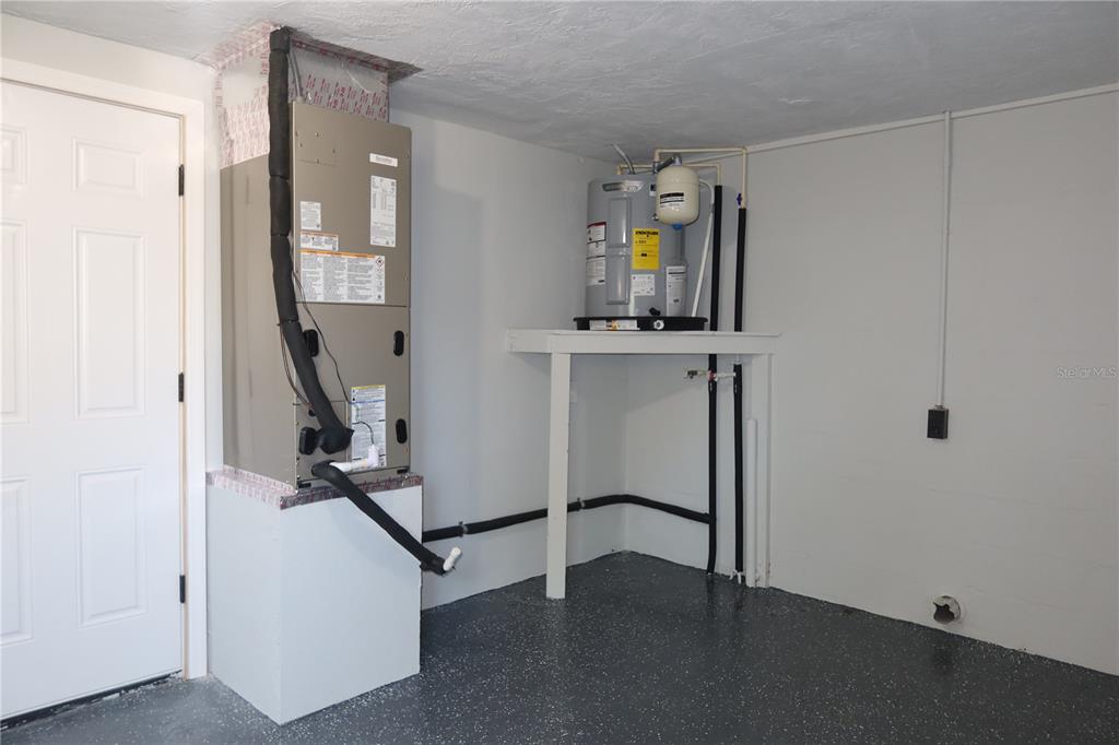 7521 Coventry Drive Port Richey, FL 34668 - Photo 31 of 45 a view of a hallway with workspace