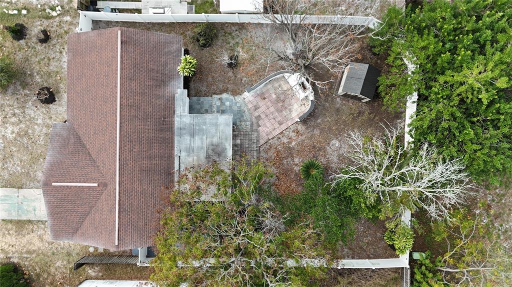 7521 Coventry Drive Port Richey, FL 34668 - Photo 41 of 45 an aerial view of a house with a yard