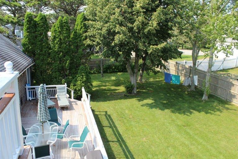 39 Pine Grove Road Chatham, MA 02633 - Photo 28 of 34 a view of a swimming pool with a patio