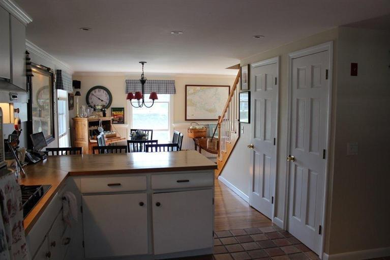 39 Pine Grove Road Chatham, MA 02633 - Photo 5 of 34 a view of a living room and staircase