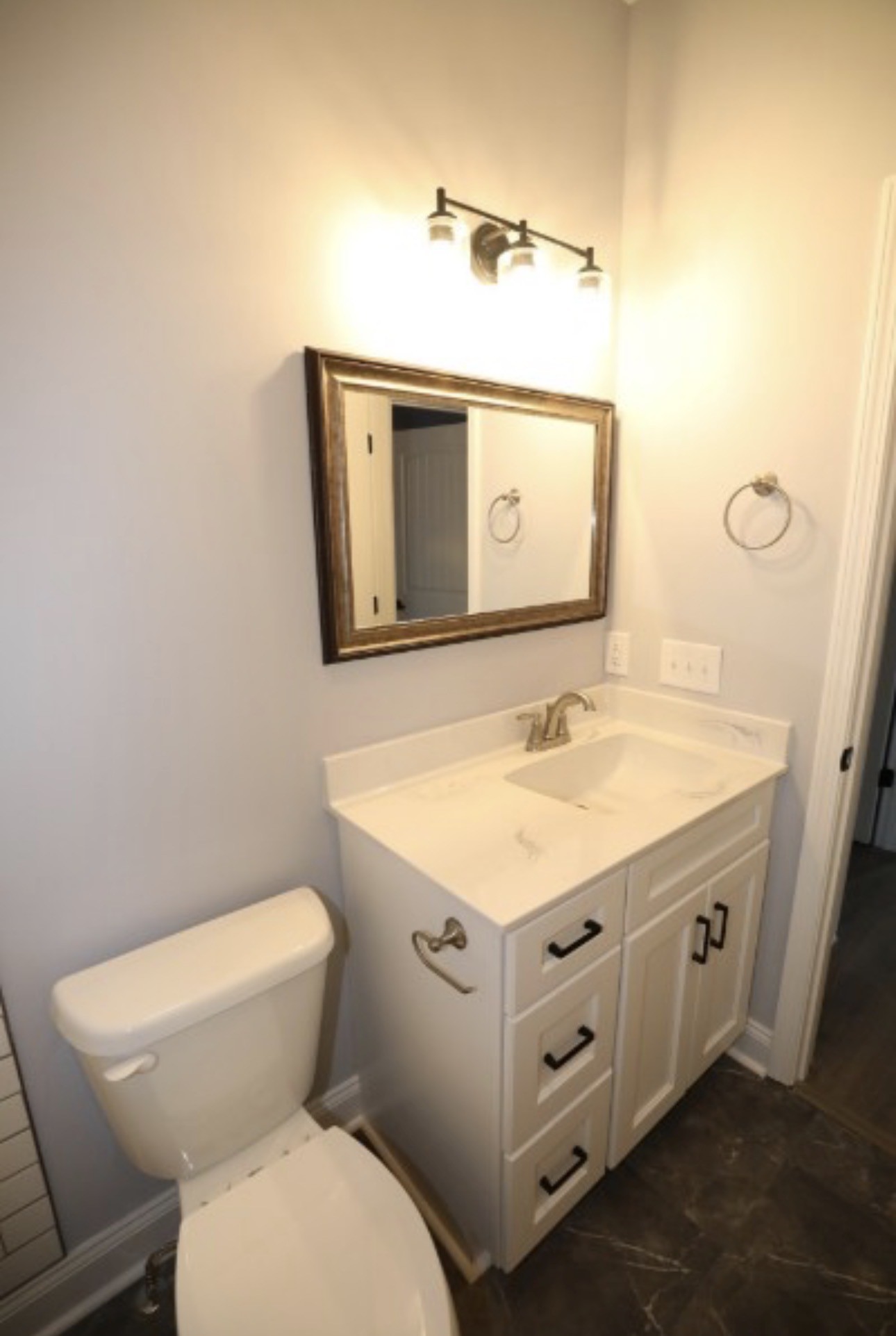 7246 Winding Way Pleasant View, TN 37146 - Photo 15 of 24 a bathroom with a sink mirror vanity and toilet