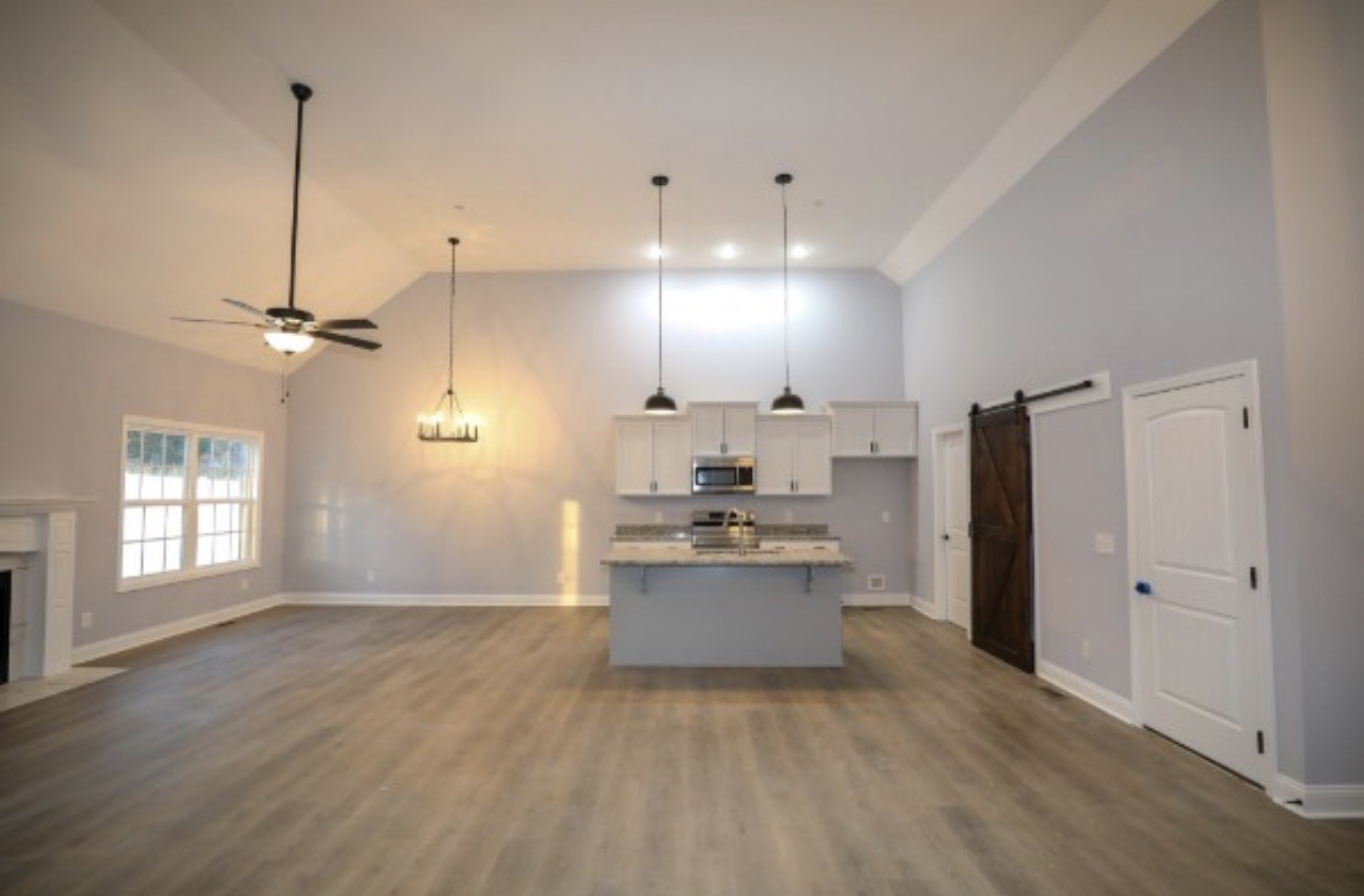 7246 Winding Way Pleasant View, TN 37146 - Photo 18 of 24 a view of a kitchen with a sink and a window