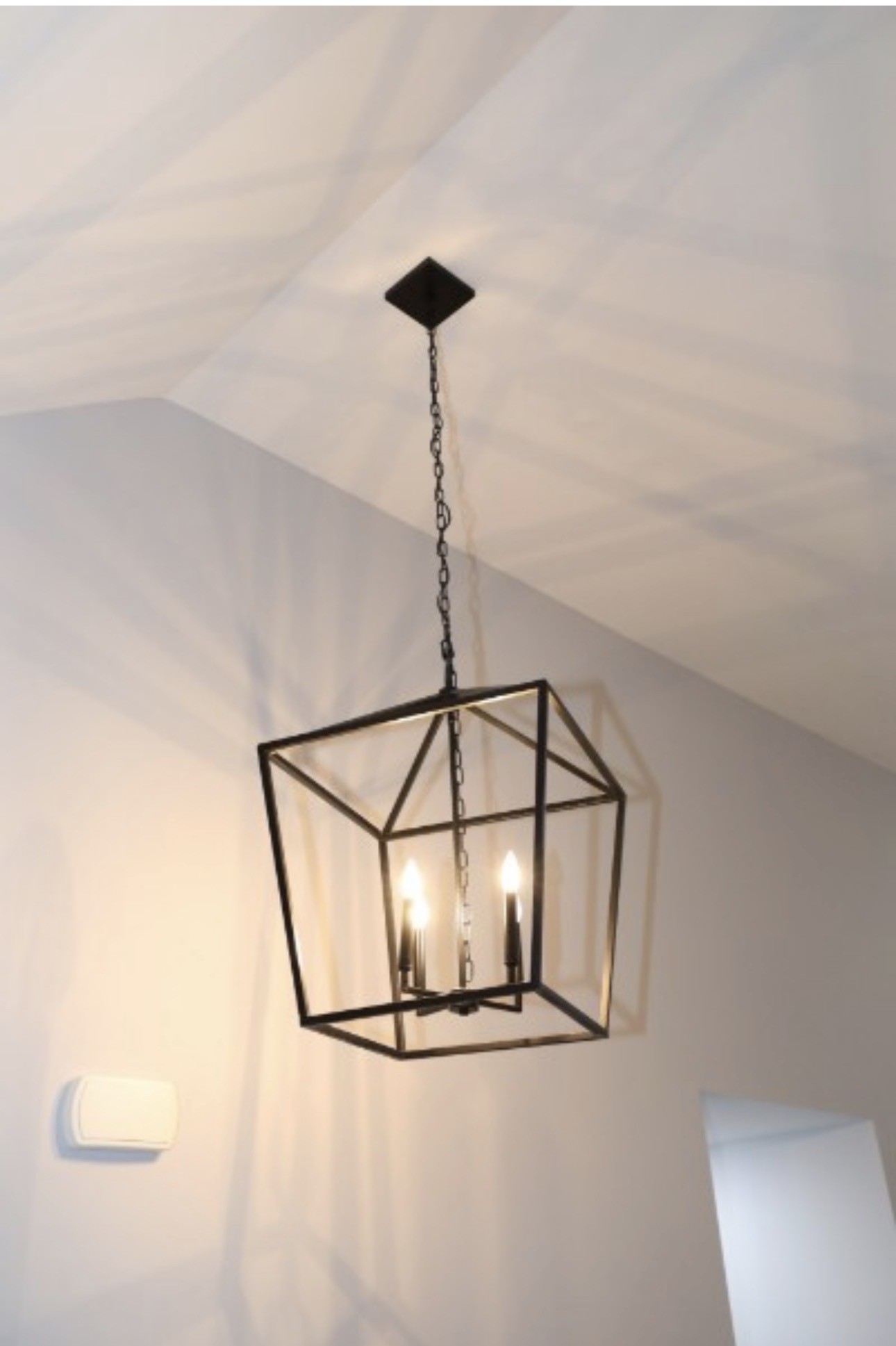 7246 Winding Way Pleasant View, TN 37146 - Photo 22 of 24 a room with a light fixture a mirror and a fan
