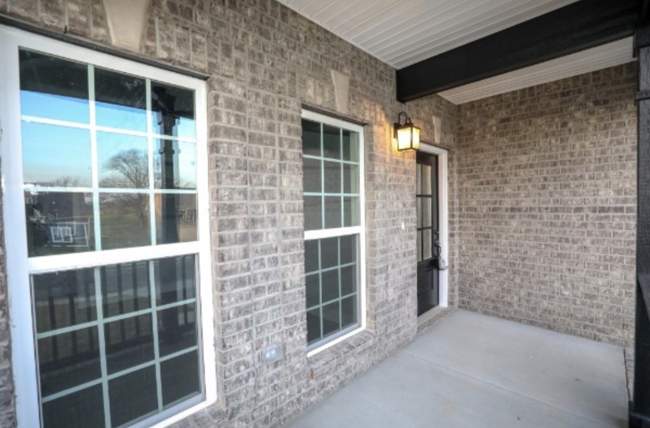 7246 Winding Way Pleasant View, TN 37146 - Photo 3 of 24 a view of front door