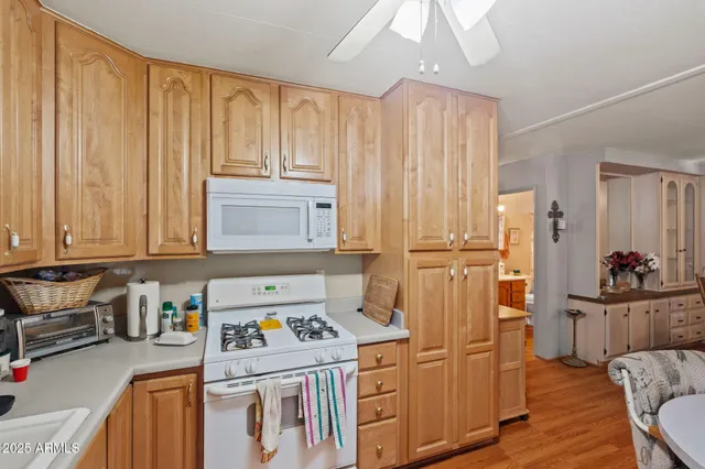 a bedroom with furniture and wooden floor