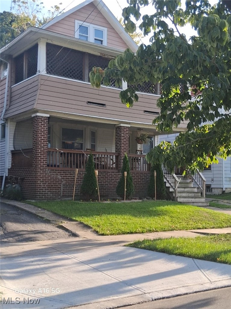 10115 Baltic Road Cleveland, OH 44102 - Photo 1 of 1 View of front facade featuring a front lawn