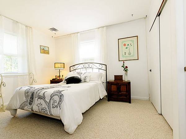192 Spiers Road Newton, MA 02459 - Photo 11 of 15 a bedroom with a bed and a cabinets