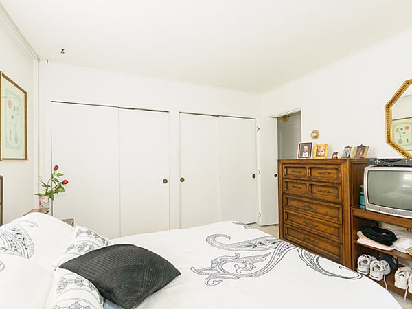 192 Spiers Road Newton, MA 02459 - Photo 12 of 15 a bedroom with a bed and a dresser