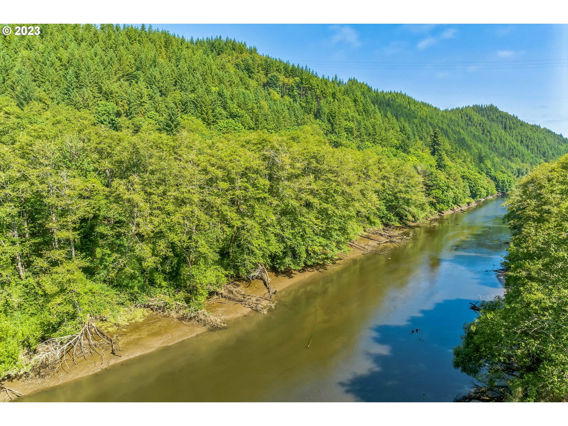 Elk City Road Toledo, OR 97391 - Photo 13 of 34 a view of an ocean and a mountain
