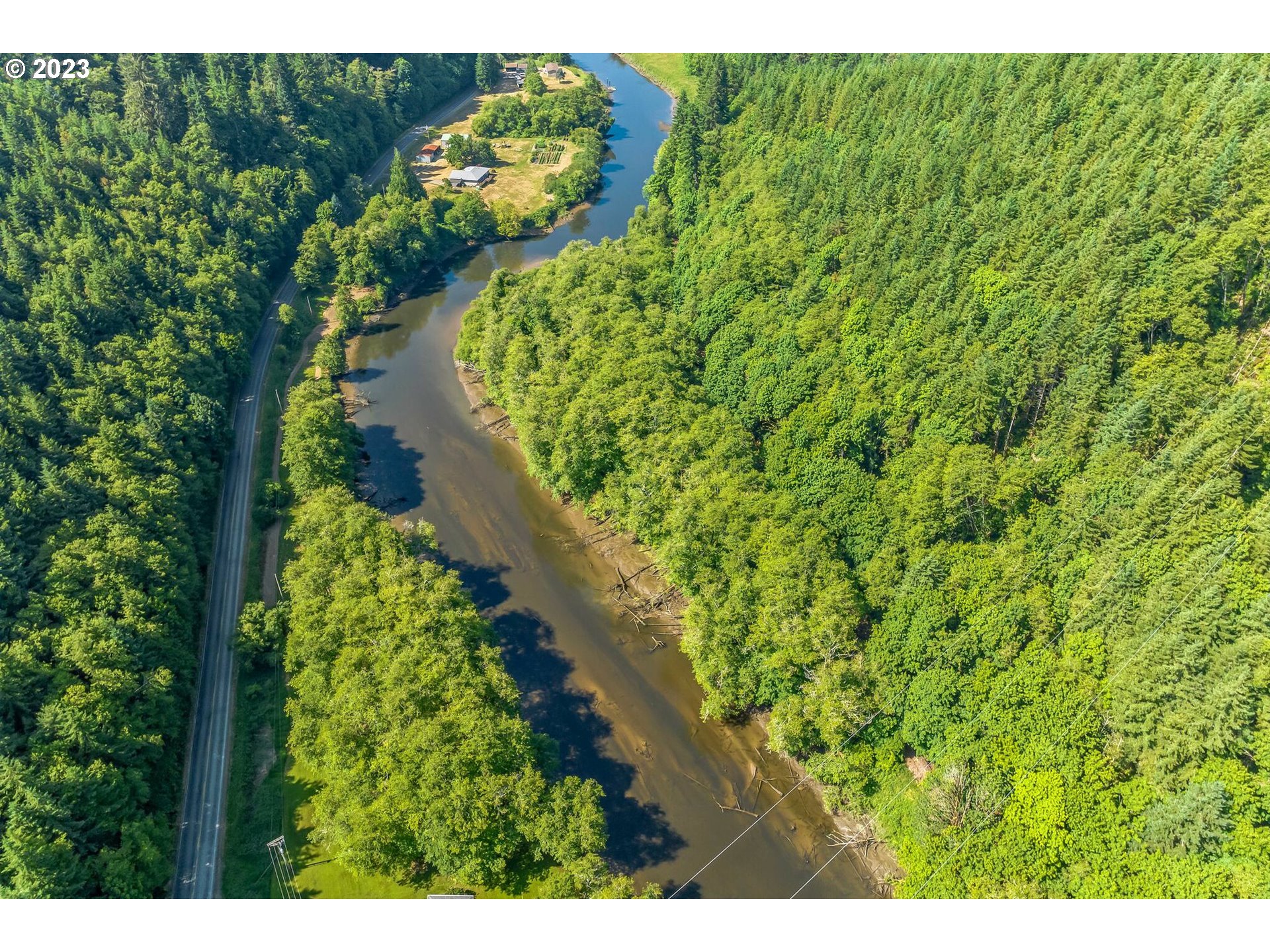 Elk City Road Toledo, OR 97391 - Photo 15 of 34 a view of a garden with a tree