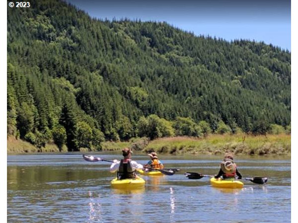 Elk City Road Toledo, OR 97391 - Photo 29 of 34 a view of swimming pool with lawn chairs