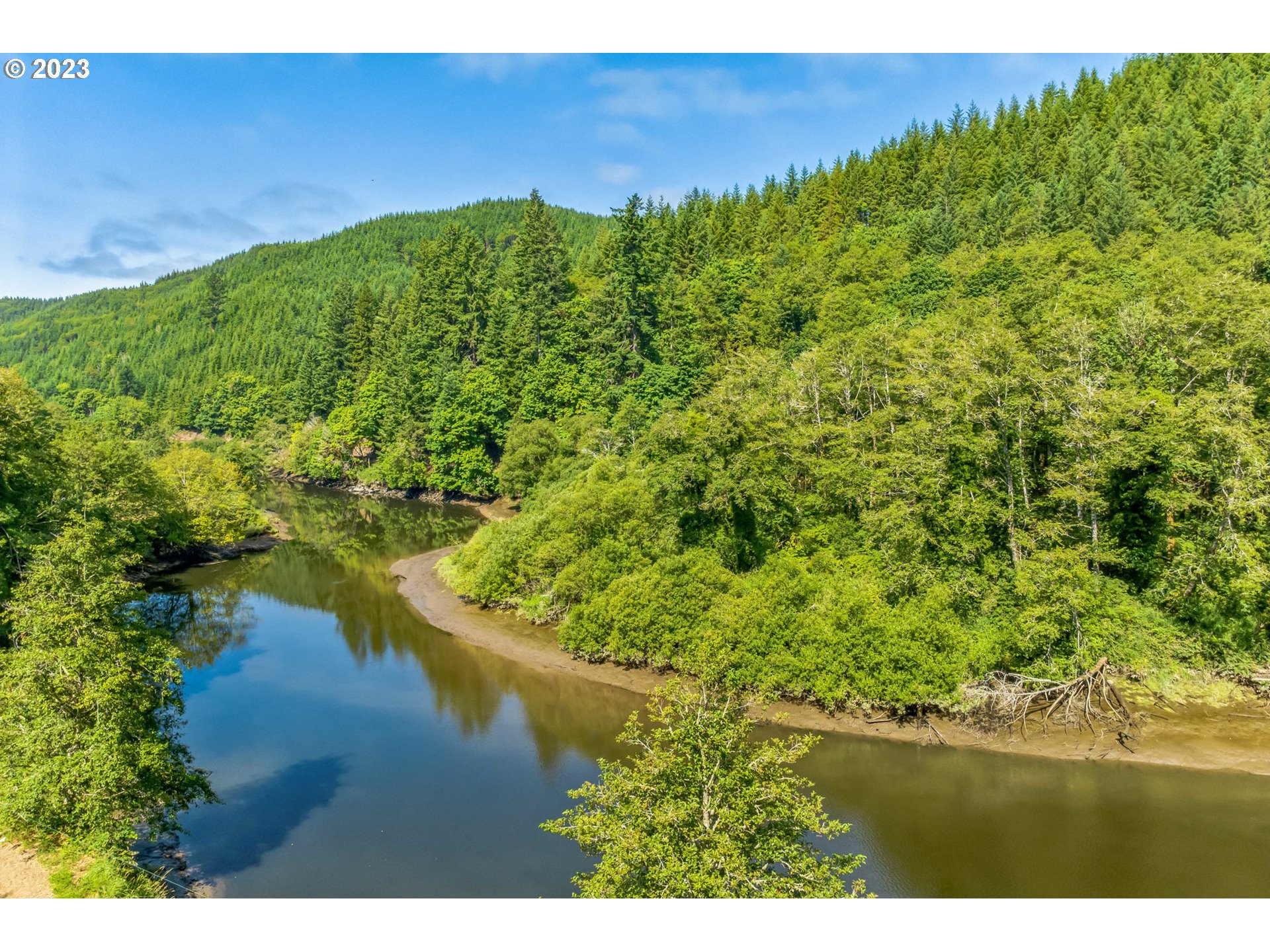 Elk City Road Toledo, OR 97391 - Photo 3 of 34 a view of a lake with a yard