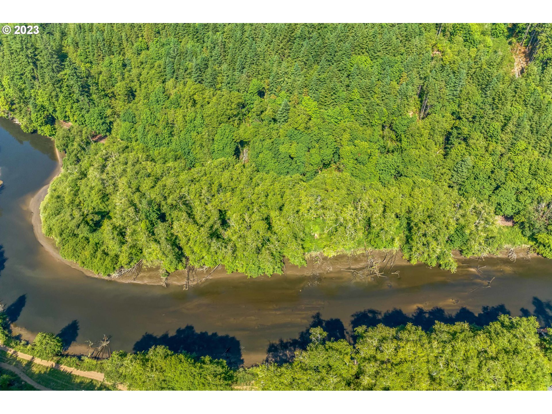 Elk City Road Toledo, OR 97391 - Photo 4 of 34 a view of a garden with a lake