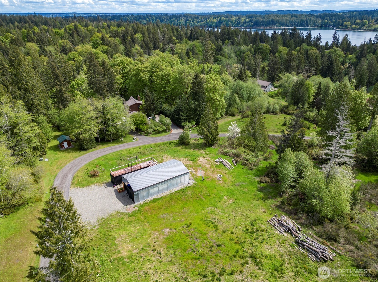 770 East April Avenue Grapeview, WA 98546 - Photo 12 of 21 a view of a yard with swimming pool