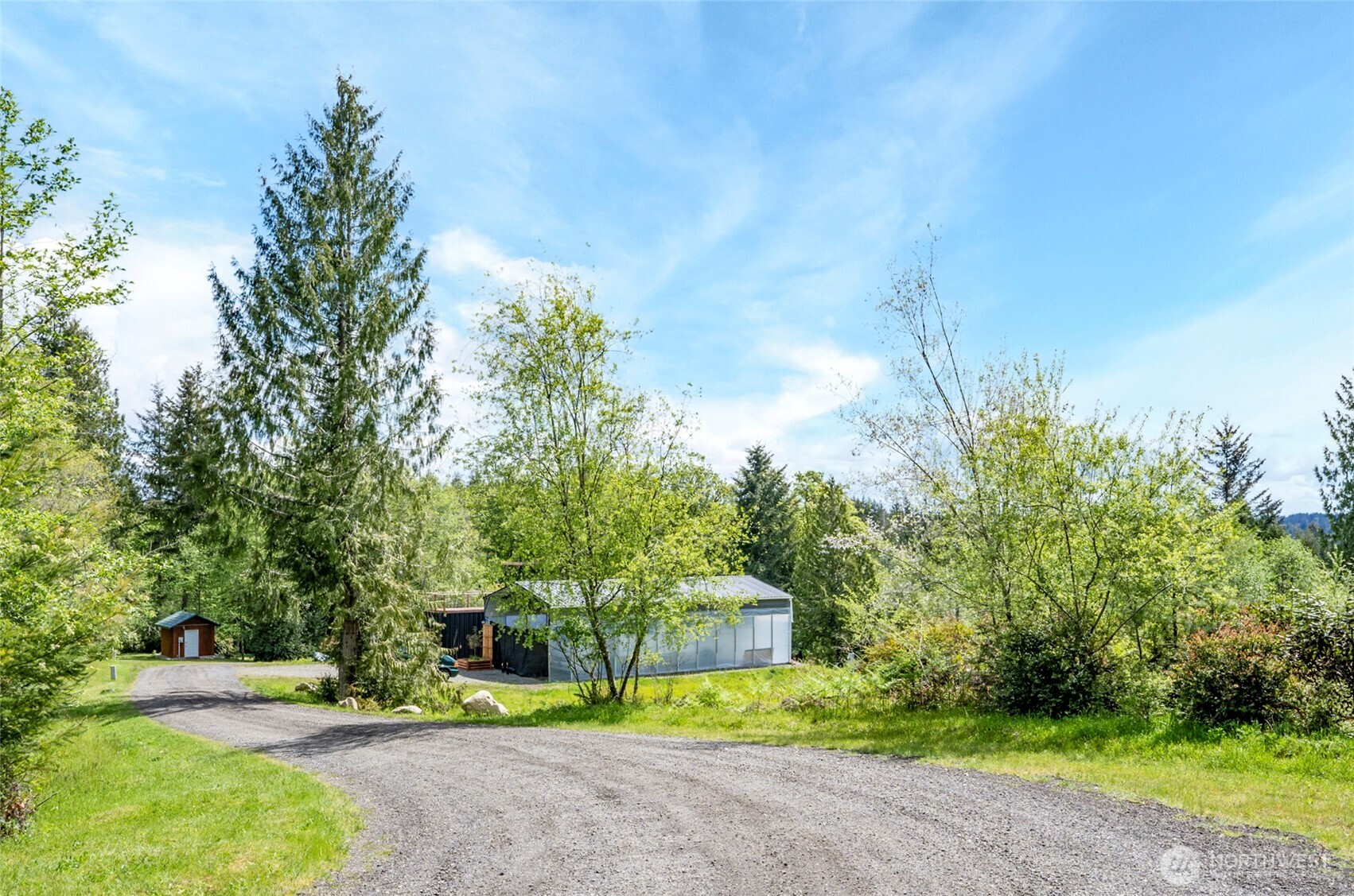 770 East April Avenue Grapeview, WA 98546 - Photo 6 of 21 a view of a park with plants and trees