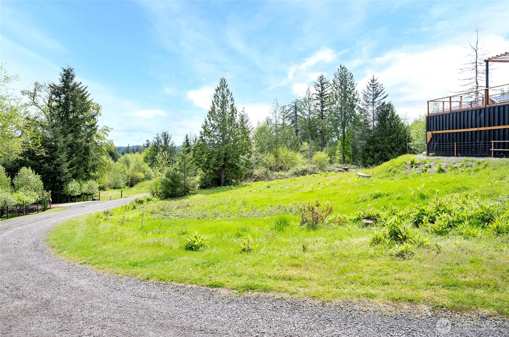 770 East April Avenue Grapeview, WA 98546 - Photo 9 of 21 a view of a backyard with swimming pool