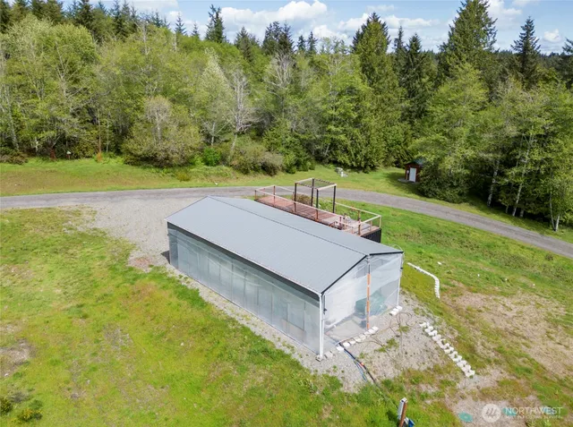 a view of a patio with a yard