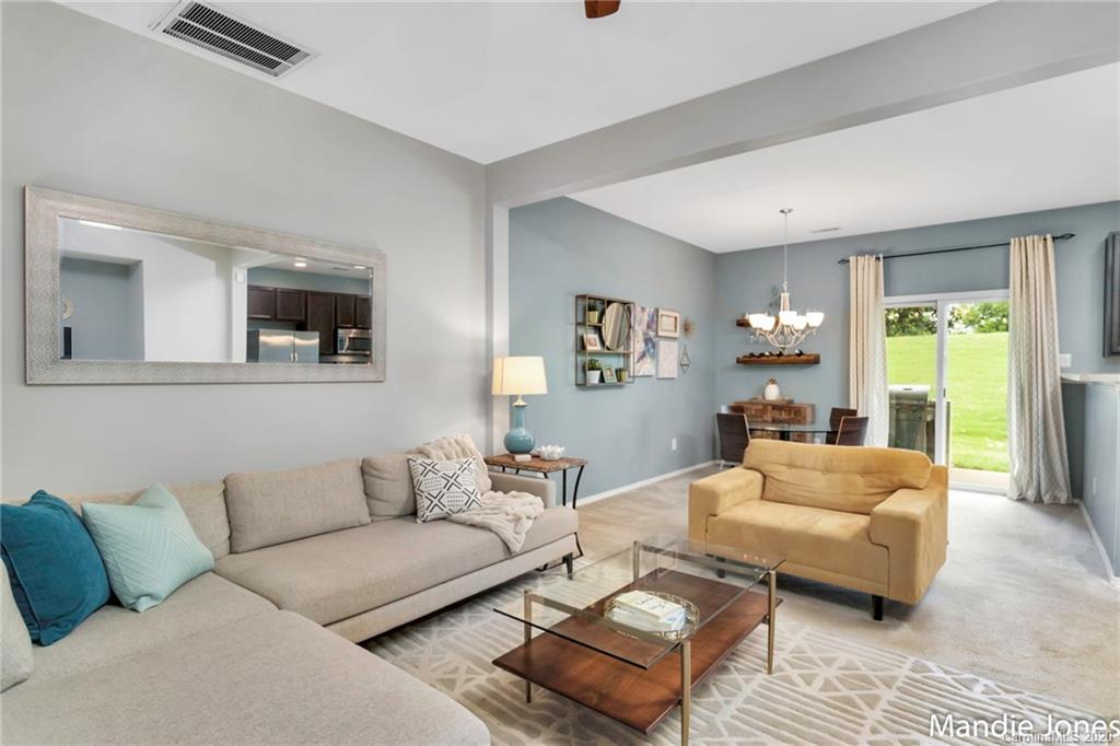 276 River Clay Road Fort Mill, SC 29708 - Photo 13 of 31 a living room with furniture and a large window