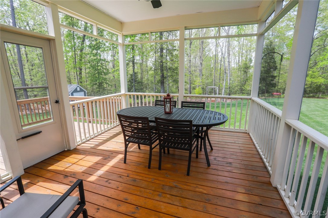 11512 Barrows Ridge Lane Chesterfield, VA 23838 - Photo 15 of 45 a view of a dining room with furniture window and wooden floor