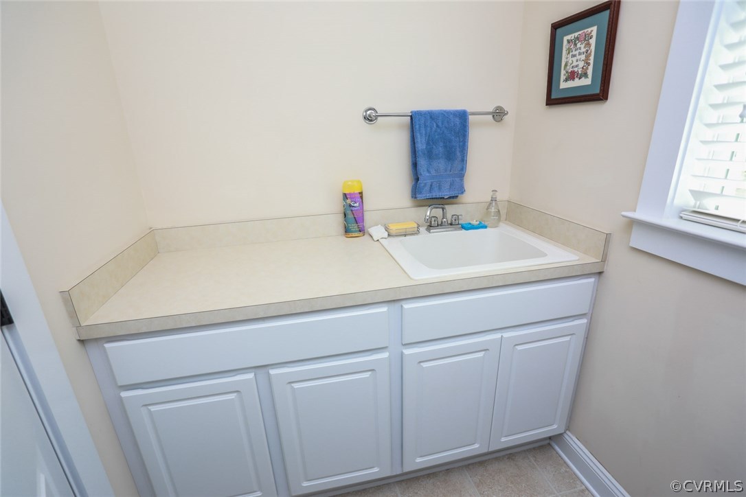 11512 Barrows Ridge Lane Chesterfield, VA 23838 - Photo 19 of 45 a bathroom with a sink and a vanity