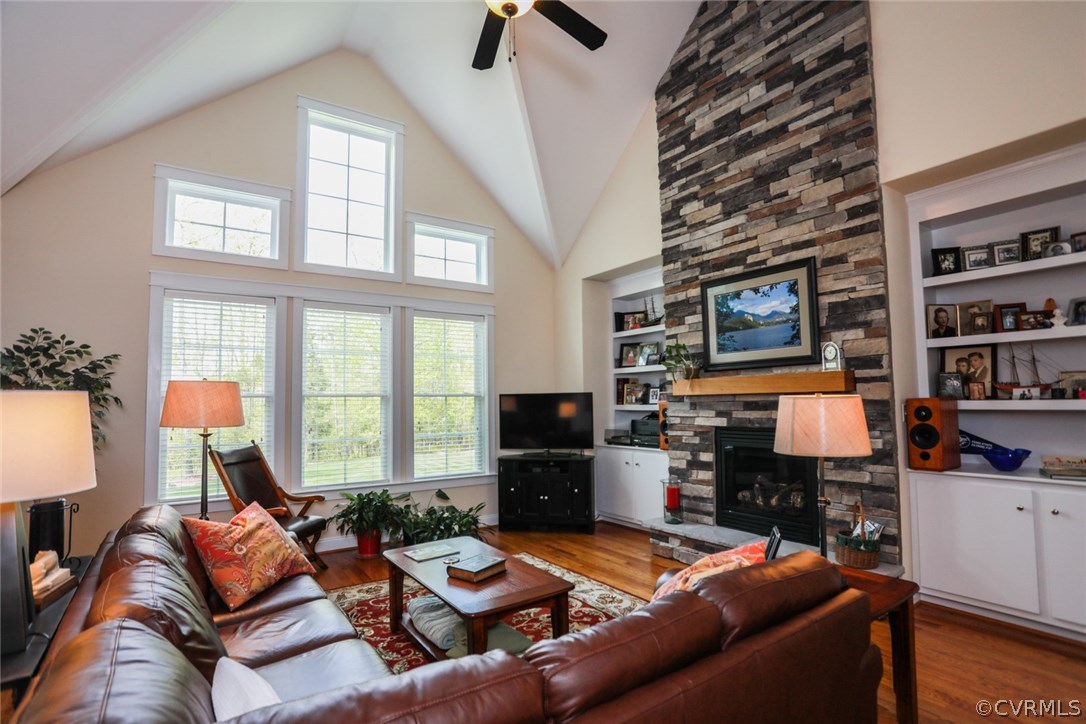 11512 Barrows Ridge Lane Chesterfield, VA 23838 - Photo 23 of 45 a living room with fireplace furniture and a flat screen tv