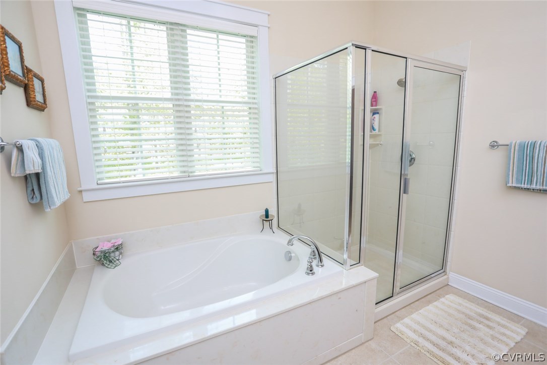 11512 Barrows Ridge Lane Chesterfield, VA 23838 - Photo 26 of 45 a white bath tub sitting next to a window