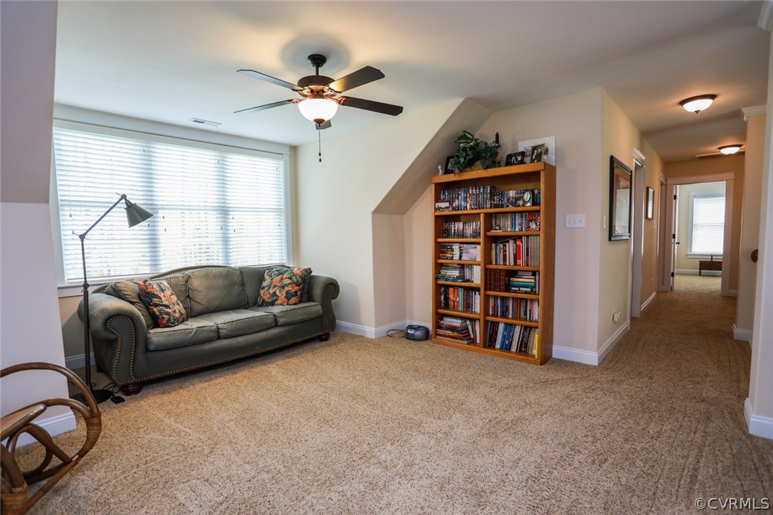 11512 Barrows Ridge Lane Chesterfield, VA 23838 - Photo 29 of 45 a living room with furniture and a window