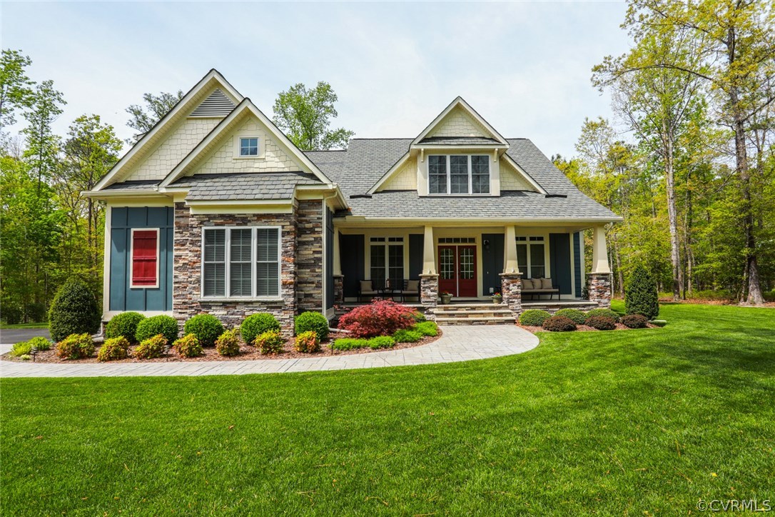 11512 Barrows Ridge Lane Chesterfield, VA 23838 - Photo 3 of 45 a front view of a house with yard and green space