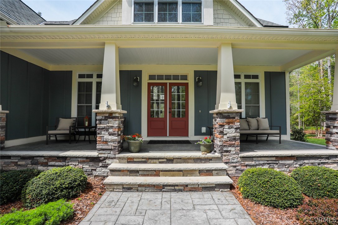 11512 Barrows Ridge Lane Chesterfield, VA 23838 - Photo 5 of 45 a front view of a house with sitting area
