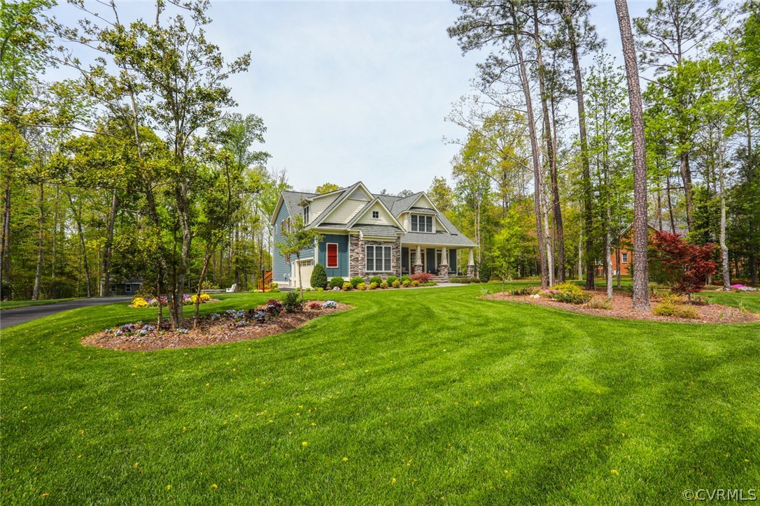 11512 Barrows Ridge Lane Chesterfield, VA 23838 - Photo 6 of 45 a view of a house with a yard porch and sitting area