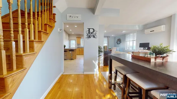 a view of a living room and dining room