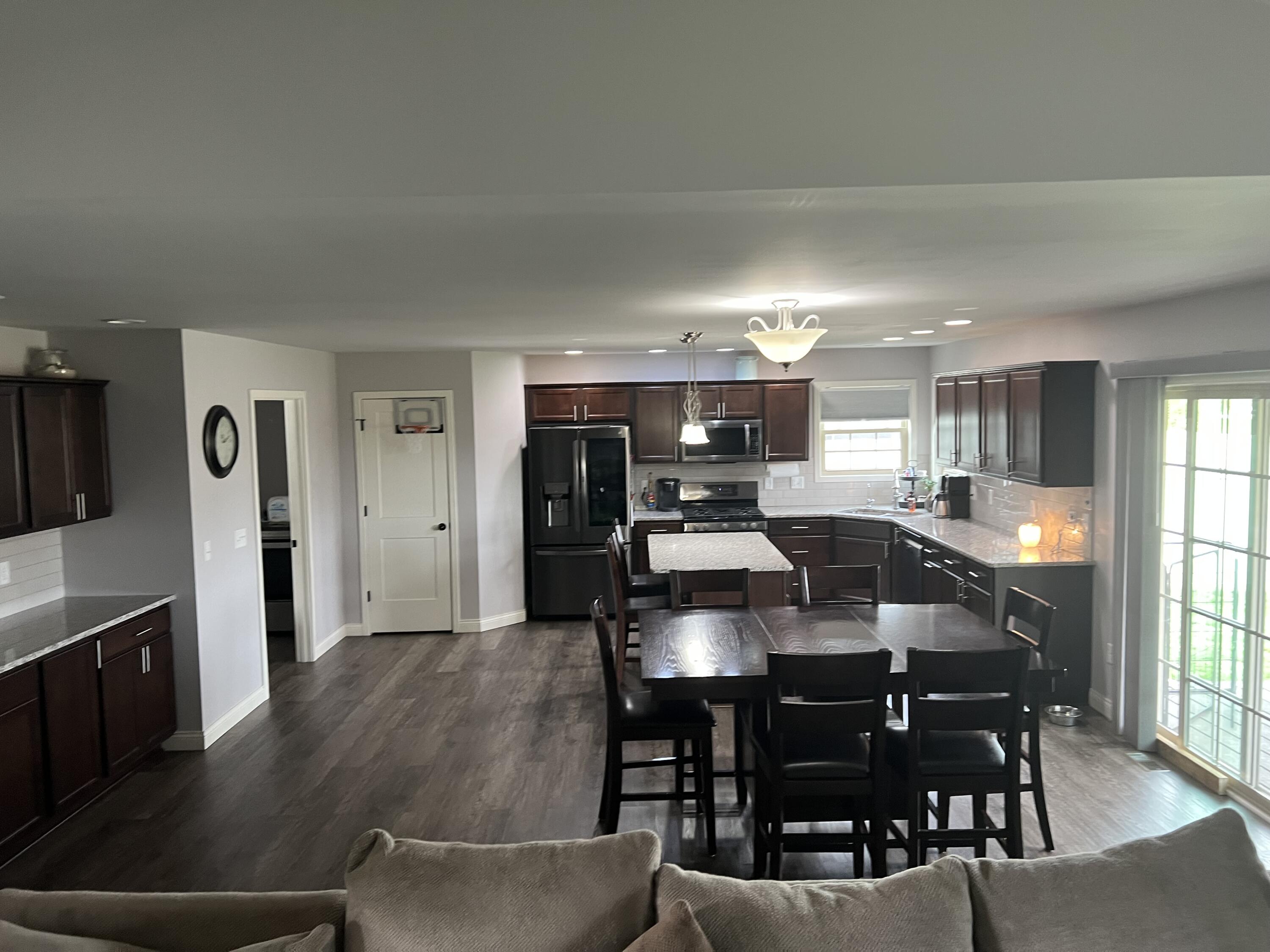702 19th Street Southeast De Motte, IN 46310 - Photo 10 of 22 a view of a dining room with furniture