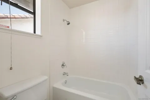 a bathroom with a bathtub