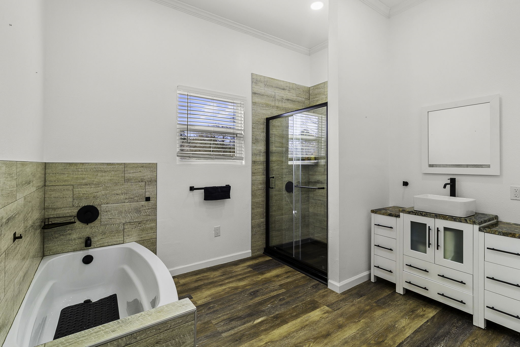 500 Highway 156 Point Blank, TX 77364 - Photo 45 of 50 a bathroom with a tub and a sink