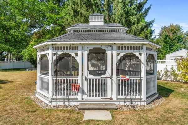 128 Meadowbrook Road Hermitage, PA 16148 - Photo 23 of 32 17x10 screened in gazebo has electric and a gas fire pit!