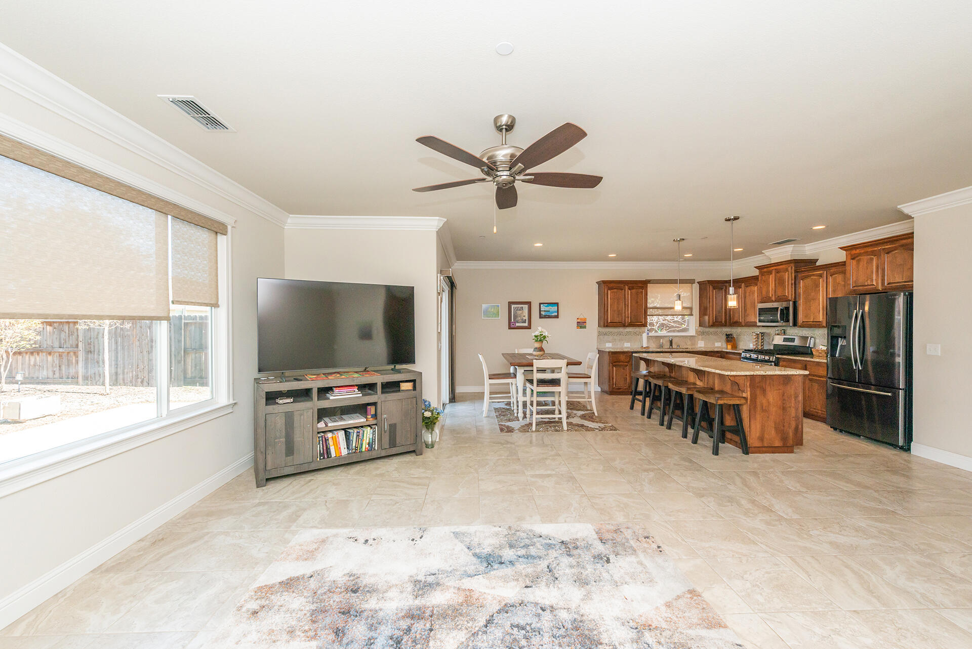 3326 Hotlam Road Redding, CA 96002 - Photo 14 of 60 a view of a livingroom with furniture and a flat screen tv