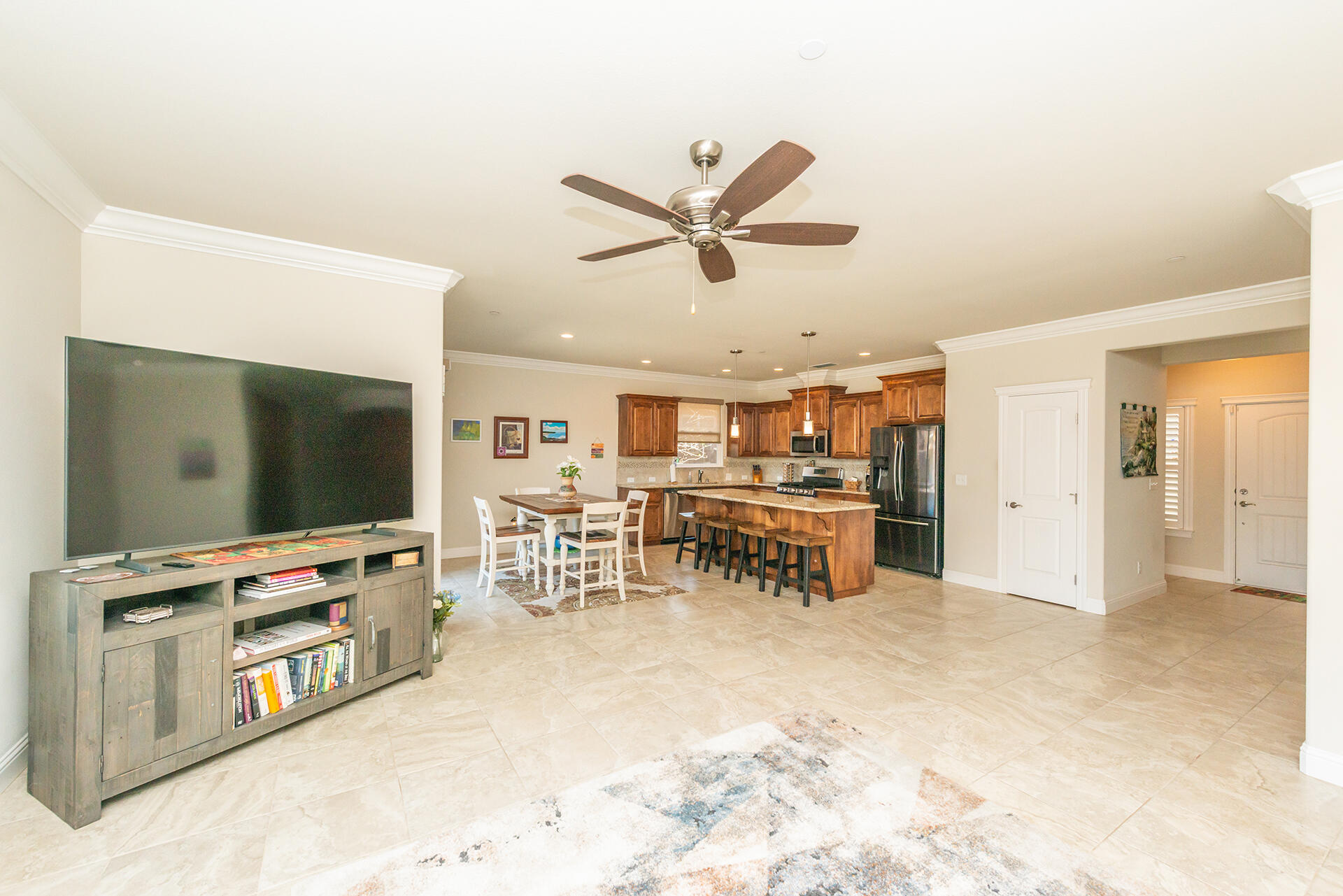 3326 Hotlam Road Redding, CA 96002 - Photo 15 of 60 a view of a livingroom with furniture and a flat screen tv