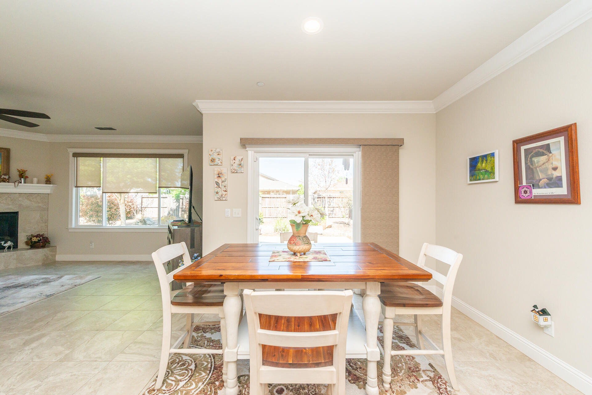 3326 Hotlam Road Redding, CA 96002 - Photo 18 of 60 a dining room with wooden floor and large windows